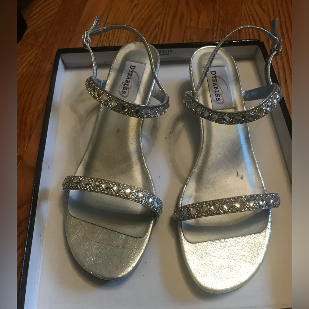 Silver with rhinestone straps, low wedge heel.